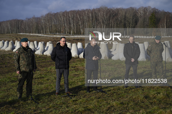 From left to right: Gen. Marek Wawrzyniak, Minister of Infrastructure Dariusz Klimczak, Prime Minister Donald Tusk, Deputy Minister of Natio...