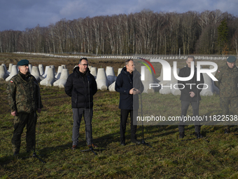 From left to right: Gen. Marek Wawrzyniak, Minister of Infrastructure Dariusz Klimczak, Prime Minister Donald Tusk, Deputy Minister of Natio...