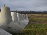 Anti-tank concrete fortifications are pictured at the Polish-Russian border in Dabrowka, Poland, on November 30, 2024. The East Shield progr...