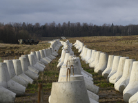 Anti-tank concrete fortifications are pictured at the Polish-Russian border in Dabrowka, Poland, on November 30, 2024. The East Shield progr...