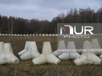 Anti-tank concrete fortifications are pictured at the Polish-Russian border in Dabrowka, Poland, on November 30, 2024. The East Shield progr...