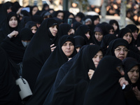 Veiled Iranian women participate in a funeral in northwestern Tehran, Iran, on November 30, 2024. (