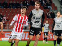 Fabian Bzdyl and Bartlomiej Kludka participate in the game between KS Cracovia and Zaglebie Lubin in Krakow, Poland, on November 29, 2024. T...