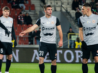 Igor Orlikowski and Damian Dabrowski participate in the game between KS Cracovia and Zaglebie Lubin in Krakow, Poland, on November 29, 2024....