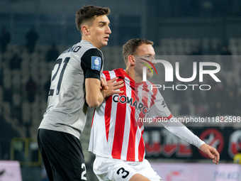 Tomasz Pienko and Andreas Skovgaard participate in the game between KS Cracovia and Zaglebie Lubin in Krakow, Poland, on November 29, 2024....