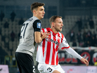 Tomasz Pienko and Andreas Skovgaard participate in the game between KS Cracovia and Zaglebie Lubin in Krakow, Poland, on November 29, 2024....