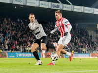 Bartosz Kopacz and Benjamin Kallman participate in the game between KS Cracovia and Zaglebie Lubin in Krakow, Poland, on November 29, 2024....