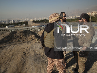 Armed IRGC special force military personnel stand together during a funeral for General Kioumars Pourhashemi, a commander of the Islamic Rev...