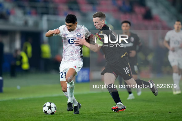 Benjamin Andre' of LOSC Lille and Lewis Ferguson of Bologna FC compete for the ball during the UEFA Champions League 2024/25 League Phase MD...