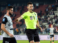 Referee Damian Kos officiates the game between KS Cracovia and Zaglebie Lubin in Krakow, Poland, on November 29, 2024. This is a PKO BP Ekst...