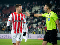 Benjamin Kallman argues with referee Damian Kos during the game between KS Cracovia and Zaglebie Lubin in Krakow, Poland, on November 29, 20...