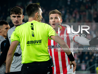 Benjamin Kallman argues with referee Damian Kos during the game between KS Cracovia and Zaglebie Lubin in Krakow, Poland, on November 29, 20...