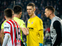 Zaglebie goalkeeper Dominik Hladun argues with referee Damian Kos during the game between KS Cracovia and Zaglebie Lubin in Krakow, Poland,...