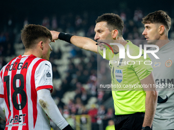 Filip Rozga argues with referee Damian Kos during the game between KS Cracovia and Zaglebie Lubin in Krakow, Poland, on November 29, 2024, d...