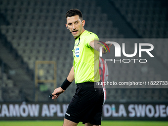 Referee Damian Kos officiates the game between KS Cracovia and Zaglebie Lubin in Krakow, Poland, on November 29, 2024. This is a PKO BP Ekst...