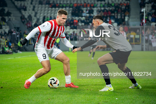 Benjamin Kallman and Jaroslaw Jach participate in the game between KS Cracovia and Zaglebie Lubin in Krakow, Poland, on November 29, 2024. T...