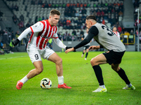 Benjamin Kallman and Jaroslaw Jach participate in the game between KS Cracovia and Zaglebie Lubin in Krakow, Poland, on November 29, 2024. T...