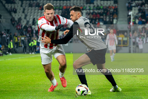 Benjamin Kallman and Jaroslaw Jach participate in the game between KS Cracovia and Zaglebie Lubin in Krakow, Poland, on November 29, 2024. T...