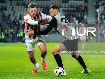 Benjamin Kallman and Jaroslaw Jach participate in the game between KS Cracovia and Zaglebie Lubin in Krakow, Poland, on November 29, 2024. T...