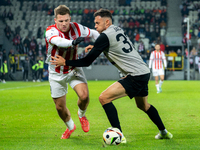 Benjamin Kallman and Jaroslaw Jach participate in the game between KS Cracovia and Zaglebie Lubin in Krakow, Poland, on November 29, 2024. T...