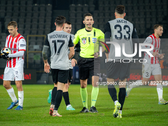 Referee Damian Kos officiates the game between KS Cracovia and Zaglebie Lubin in Krakow, Poland, on November 29, 2024. This is a PKO BP Ekst...