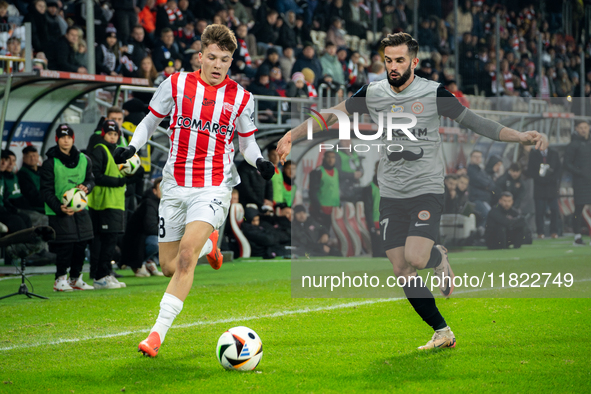 Filip Rozga and Mateusz Wdowiak participate in the game between KS Cracovia and Zaglebie Lubin in Krakow, Poland, on November 29, 2024. This...