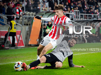 Filip Rozga and Mateusz Wdowiak participate in the game between KS Cracovia and Zaglebie Lubin in Krakow, Poland, on November 29, 2024. This...