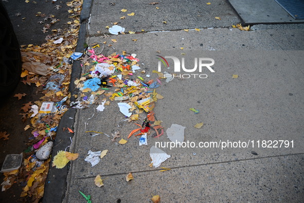 Debris is on the ground on Holland Avenue. The New York City Police Department asks for the public's assistance in locating a suspect and ve...