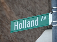 Street signage marks the location of the collision. The New York City Police Department asks for the public's assistance in locating a suspe...