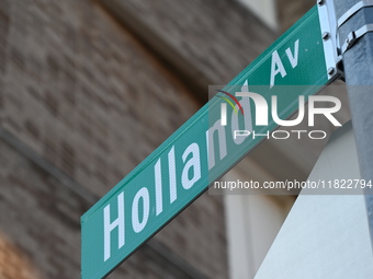 Street signage marks the location of the collision. The New York City Police Department asks for the public's assistance in locating a suspe...