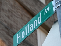 Street signage marks the location of the collision. The New York City Police Department asks for the public's assistance in locating a suspe...