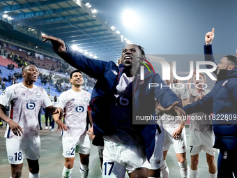 Ngal'ayel Mukau of LOSC Lille celebrates the victory with his teammates at the end of the UEFA Champions League 2024/25 League Phase MD5 mat...