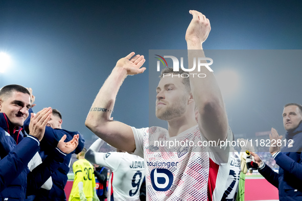 Gabriel Gudmundsson of LOSC Lille celebrates the victory at the end of the UEFA Champions League 2024/25 League Phase MD5 match between Bolo...