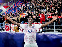 Ngal'ayel Mukau of LOSC Lille celebrates the victory with his supporters at the end of the UEFA Champions League 2024/25 League Phase MD5 ma...