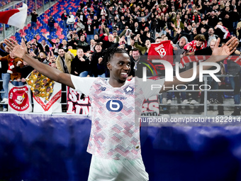 Ngal'ayel Mukau of LOSC Lille celebrates the victory with his supporters at the end of the UEFA Champions League 2024/25 League Phase MD5 ma...