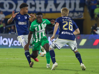 Andres Llinas and Marino Hinestroza of Millonarios fight for the ball during the match on the 3rd date of the semifinal quadrangulars of gro...