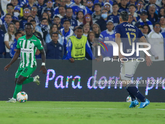 Jorge Arias of Millonarios and Marino Hinestroza of Atletico Nacional fight for the ball during the match on the third date of the semifinal...