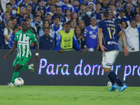 Jorge Arias of Millonarios and Marino Hinestroza of Atletico Nacional fight for the ball during the match on the third date of the semifinal...