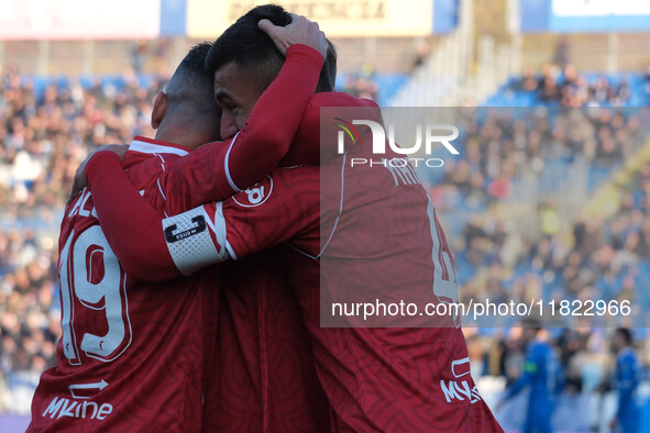 The SSC Bari team celebrates after scoring a goal during the Italian Serie B soccer championship match between Brescia Calcio and SSC Bari a...