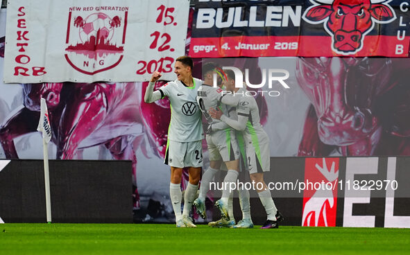 Tiago Tomas of VfL Wolfsburg  celebrates the teams second goal during the Bundesliga match between RB Leipzig and VfL Wolfsburg at Red Bull...