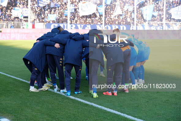 The Brescia Calcio FC team concentrates before the Italian Serie B soccer championship match between Brescia Calcio and SSC Bari at Mario Ri...