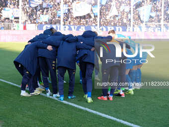 The Brescia Calcio FC team concentrates before the Italian Serie B soccer championship match between Brescia Calcio and SSC Bari at Mario Ri...