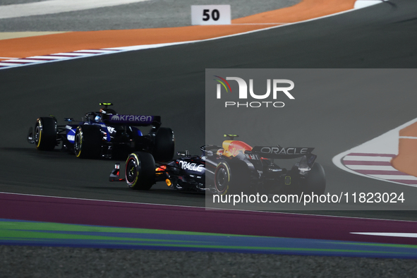 Franco Colapinto of Williams and Sergio Perez of Red Bull Racing during Sprint ahead of the Formula 1 Grand Prix of Qatar at Lusail Internat...