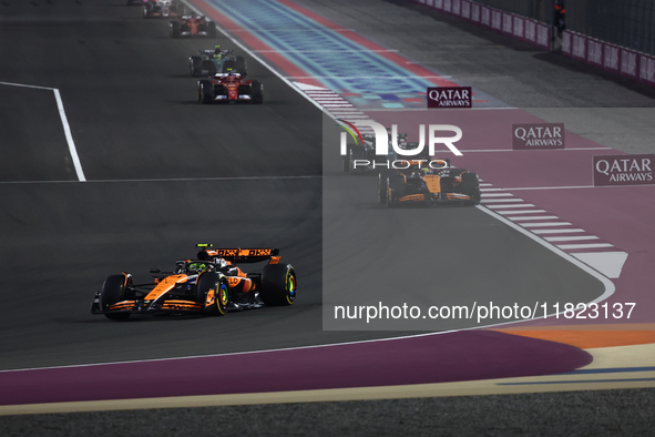 Lando Norris and Oscar Piastri of McLaren during Sprint ahead of the Formula 1 Grand Prix of Qatar at Lusail International Circuit in Lusail...