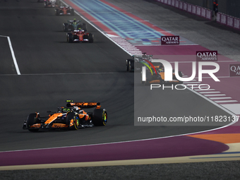 Lando Norris and Oscar Piastri of McLaren during Sprint ahead of the Formula 1 Grand Prix of Qatar at Lusail International Circuit in Lusail...