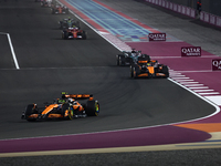 Lando Norris and Oscar Piastri of McLaren during Sprint ahead of the Formula 1 Grand Prix of Qatar at Lusail International Circuit in Lusail...