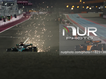 George Russell of Mercedes and Oscar Piastri of McLaren during Sprint ahead of the Formula 1 Grand Prix of Qatar at Lusail International Cir...