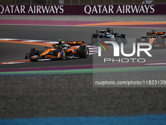 Lando Norris, Oscar Piastri of McLaren and George Russell of Mercedes during Sprint ahead of the Formula 1 Grand Prix of Qatar at Lusail Int...