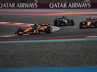 Lando Norris, Oscar Piastri of McLaren and George Russell of Mercedes during Sprint ahead of the Formula 1 Grand Prix of Qatar at Lusail Int...