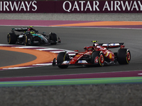 Carlos Sainz of Ferrari and Lewis Hamilton of Mercedes during Sprint ahead of the Formula 1 Grand Prix of Qatar at Lusail International Circ...